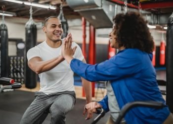 A woman giving high five to her coach